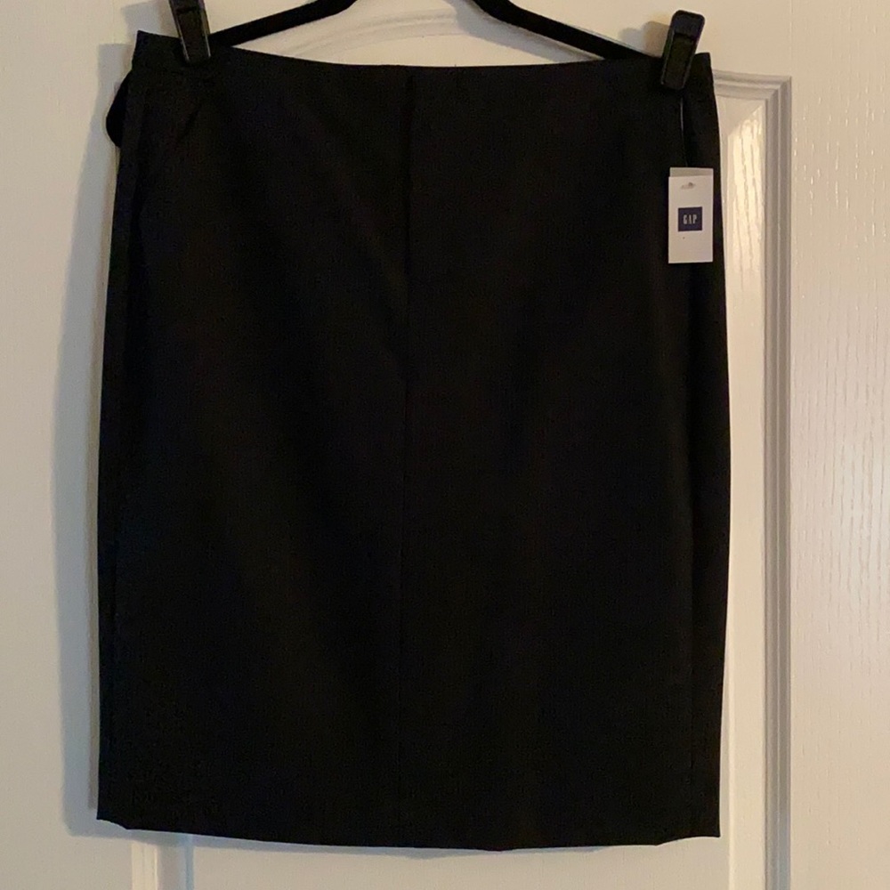Black, pinstriped pencil skirt.
